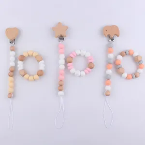 Baby pacifier clip and teething ring set with star and elephant wooden beads