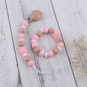 Silicone rose baby teether bracelet and pacifier clip set with pink wooden beads