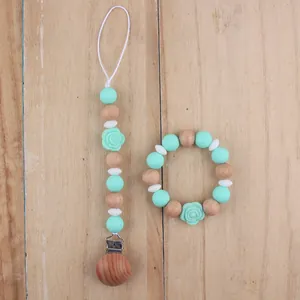 Silicone rose bead pacifier clip and wooden teething bracelet set for infants