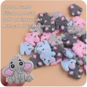 Detail view of colorful soft silicone elephant charms for baby pacifier clips