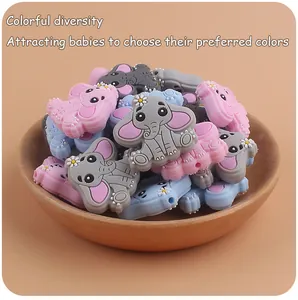 Detailed view of colorful elephant silicone teethers for creative baby pacifier clips
