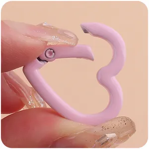 Pink heart-shaped spring ring clasp for DIY keychains and accessories shown open