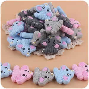 Cartoon elephant silicone teething beads with daisy accent in blue, grey, and pink