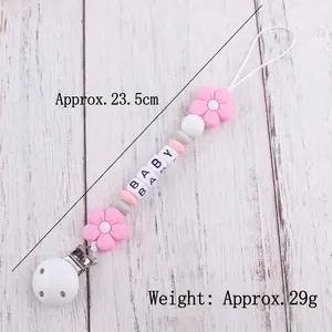 Baby pacifier clip with cartoon flower silicone beads and BABY letter squares on wood