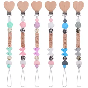 Silicone pacifier clip set with beech wood heart clamp and colorful baby beads