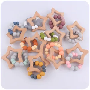 Star-shaped beech wood and colorful silicone bead baby teether rings in assorted colors