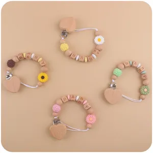 Handmade beech wood baby pacifier clip with daisy silicone beads and baby letter beads
