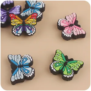 Breloques papillon 3D colorées pour accessoires bébé avec textures d'ailes arc-en-ciel