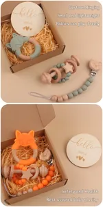 Detailed gift set featuring cartoon fox silicone teething toys and beech wood rattles