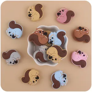 Detailed view of colorful squirrel silicone teething beads for baby pacifier clips