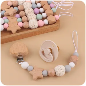 Attache-tétine en silicone et bois avec clip en forme de cœur pour nourrissons et bébés
