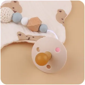 Ensemble tétine et attache avec perles en silicone et boule au crochet sur tissu ours