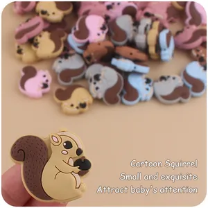 Macro detail of cartoon squirrel silicone beads in assorted colors for DIY pacifier clips