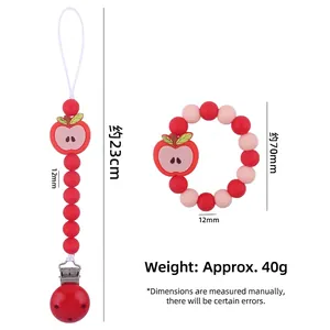 Silicone baby pacifier clip and teething bracelet set featuring red apple beads and wood clip
