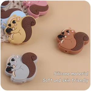 Detailed macro view of soft colorful silicone squirrel beads for DIY teething accessories