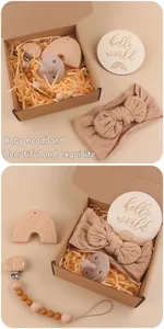 Newborn gift set with rainbow beech wood teether, pacifier clip and bow headband