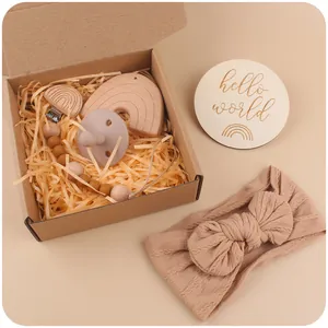 Baby gift set with rainbow beech wood teether, pacifier chain and bow headband