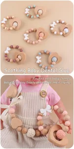 Detail view of handmade baby pacifier clips with wood beads, silicone and heart shapes