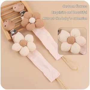 Handmade baby pacifier clip with beech wood and soft floral linen fabric strap