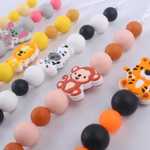 Silicone baby pacifier clips with cute animal shapes like elephants and lions