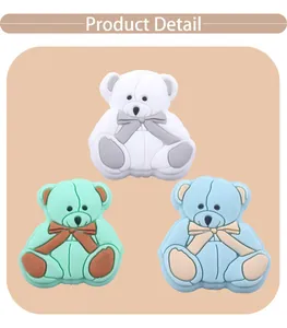 Detail view of cartoon bear silicone beads for DIY pacifier chains in three colors