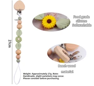 Detail of 27cm baby pacifier chain with beech wood clip and sunflower silicone beads
