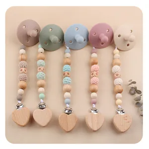 Five-piece baby pacifier clip set with beech wood stars and colorful silicone beads