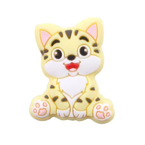 Détail de la perle en silicone chaton jaune pour attache-tétine et bracelet de dentition