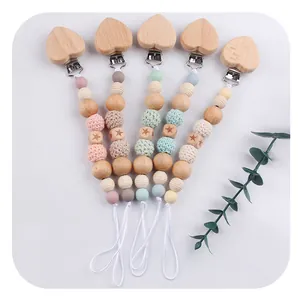 DIY beech wood and silicone baby pacifier clip set with heart-shaped wooden clips