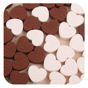 Silicone heart beads with leaf patterns in brown and cream for DIY baby teething jewelry