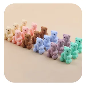 Macro detail of colorful silicone bear beads for DIY baby pacifier clips and teethers