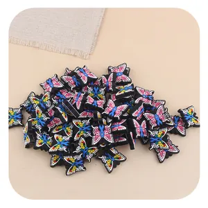 Colorful silicone butterfly charms with blue ribbon design for DIY jewelry making