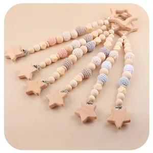 Set catenelle portaciuccio in legno di faggio con stelle e perline all'uncinetto