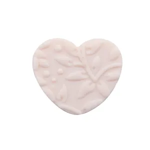 Detail of heart silicone bead with 3D floral embossing for baby teether DIY projects