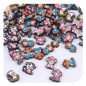 Detailed assortment of colorful cartoon cow silicone beads for creative DIY pacifier chains