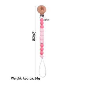 Pink silicone baby pacifier clip with beech wood star clip and white BABY letter beads