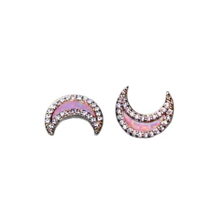 Rose gold crescent moon stud earrings with pink opal inlay and sparkling zircon border