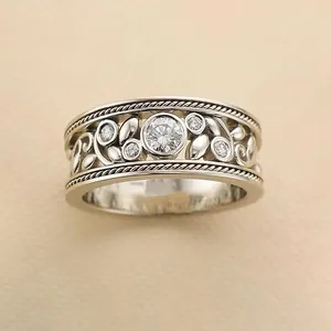 Retro hollow floral wide band ring with sparkling crystal stones in silver finish