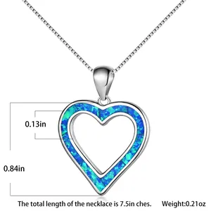 Detail view of heart pendant with blue opal and box chain, including size measurements