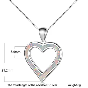 Detail view showing blue heart opal pendant dimensions with 21.2mm height and 3.4mm width