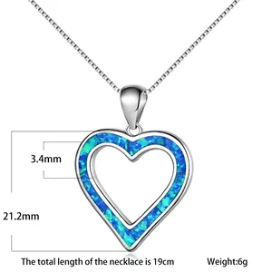 Detail view of heart-shaped blue opal pendant necklace with precise dimensions and weight