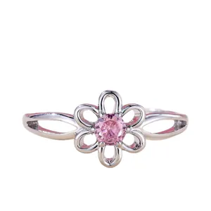 Silver flower ring with a round pink crystal and elegant hollow band for women