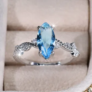 Marquise Cut Sea Blue Zircon Ring For Women Silver Plated Copper Intertwined Band Sparkling Rhinestone Wedding Party Jewelry