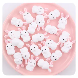 Detailed view of DIY bulk white silicone rabbit teether beads for baby pacifier clips