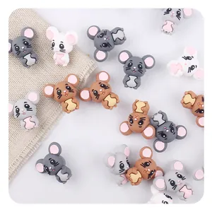 Macro view of colorful silicone cartoon mouse beads for DIY baby teething pacifier clips