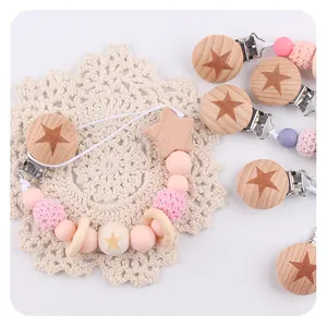 Star engraved beech wood pacifier clip with colorful silicone and crochet beads