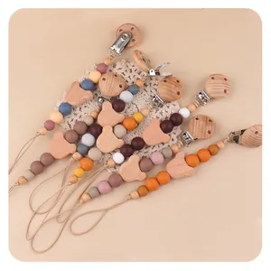 Baby Schnullerkette aus Buchenholz mit Cartoon-Bärenkopf und bunten Silikonperlen