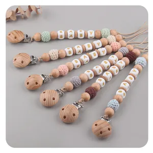 Handmade beech wood pacifier clip with colorful crochet beads and baby letter beads