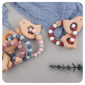 Infant bird beech wood and silicone teething bracelet with Morandi colored beads