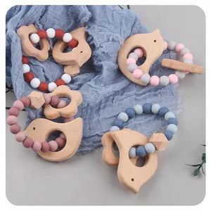 Baby silicone teething bracelet with beech wood bird pendant and soft colorful beads